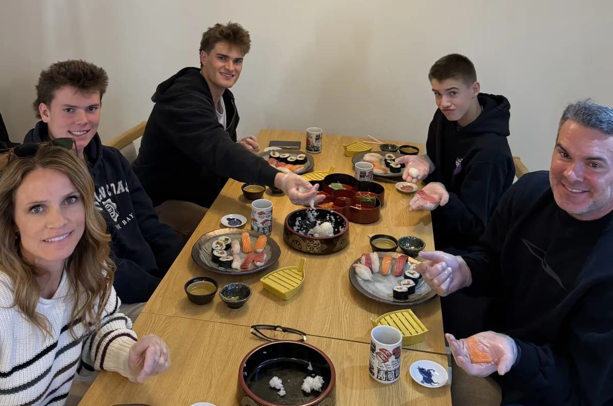 Family group with their finished sushi plates